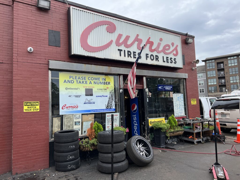 Storefront of Curries Tires on West Ave. in Norwalk.